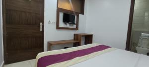 Postel nebo postele na pokoji v ubytování Hotel A10