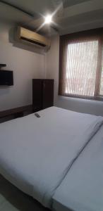 Postel nebo postele na pokoji v ubytování Hotel A10