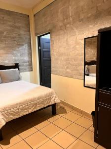 Кровать или кровати в номере Hotel Terracota
