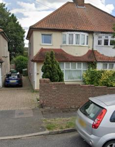 a house with a car parked in front of it at Sidcup Stay in Sidcup