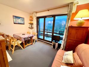 Posezení v ubytování Le Saphir - Vue spectaculaire sur les Montagnes + 16 fotografií