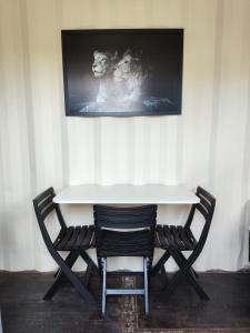 TV a/nebo společenská místnost v ubytování Pousada Dona Chica