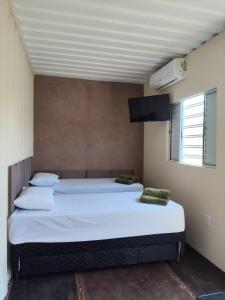 Postel nebo postele na pokoji v ubytování Pousada Dona Chica