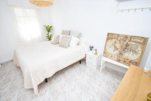 A bed or beds in a room at C57 - Spacious and Bright Apartment