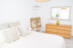 A bed or beds in a room at C57 - Spacious and Bright Apartment