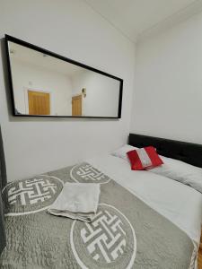 Postel nebo postele na pokoji v ubytování Venice Hotel