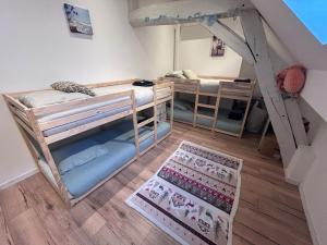 an overhead view of a room with bunk beds at LOasis Dijonnaise 8 PEOPLE in Sennecey-lès-Dijon