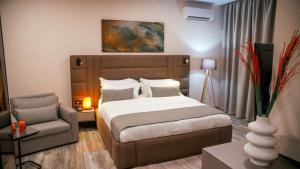 Postel nebo postele na pokoji v ubytování Hotel Dirista