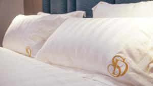 Postel nebo postele na pokoji v ubytování Hotel Dirista