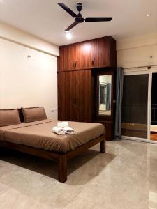 Postel nebo postele na pokoji v ubytování Ameya Coorg Home Stay