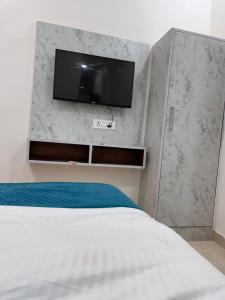 Voodi või voodid majutusasutuse Hotel Rohit ,Agra cantt Railway station toas