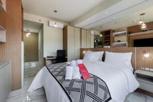 Postel nebo postele na pokoji v ubytování Zainalofts7Vila Mariana ao lado metrô, CASV 37 ID