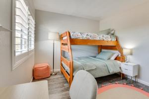a small bedroom with a bunk bed and a desk at Centrally Located Cave Creek Retreat with Backyard in Cave Creek +33 photos