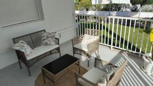 Ein Balkon oder eine Terrasse in der Unterkunft Cala Ferrera HOME&ME