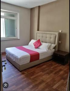 Katil atau katil-katil dalam bilik di Hotel Astoria Tanger
