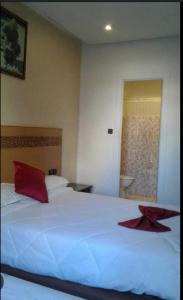 Katil atau katil-katil dalam bilik di Hotel Astoria Tanger