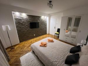 Voodi või voodid majutusasutuse Apartman Jevtic toas
