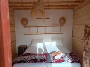 Postel nebo postele na pokoji v ubytování Aftass Hostel