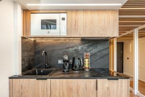 Η κουζίνα ή μικρή κουζίνα στο Cozy loft in city center +15 φωτογραφίες