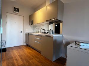 Kuchyň nebo kuchyňský kout v ubytování Apartments Zevs Kavac