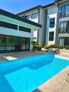 Πισίνα στο ή κοντά στο Condominio Novatriana