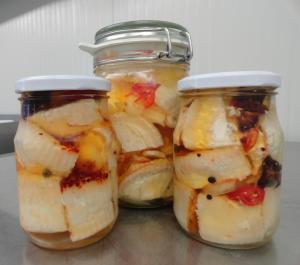 two mason jars with food inside of a refrigerator at Agroturistika kozí farma Rožnov pod Radhoštěm in Rožnov pod Radhoštěm