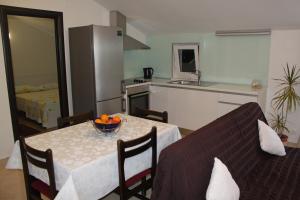 Kuchyň nebo kuchyňský kout v ubytování Apartment Frzop