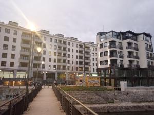 a row of apartment buildings in a city at night at Dolce Vita in Užice +7 photos