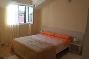 Postel nebo postele na pokoji v ubytování Apartment Frzop