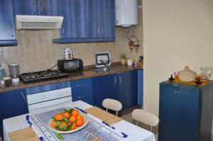 Virtuve vai virtuves zona naktsmītnē Rabat Appartement Agdal