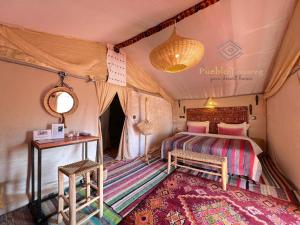 Postel nebo postele na pokoji v ubytování Pueblo Touareg - Private Tents