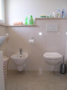 Kúpeľňa v ubytovaní Apartments Tih