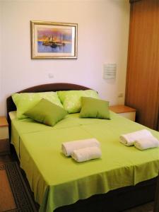 Posteľ alebo postele v izbe v ubytovaní Apartments Tih