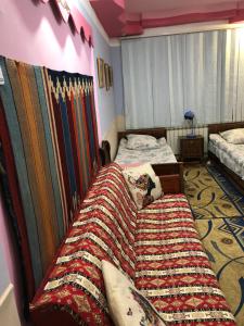 Postel nebo postele na pokoji v ubytování Guest House Dompolski