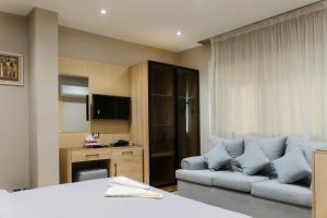 Een TV en/of entertainmentcenter bij Mirage pyramids view hotel

