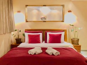 Postel nebo postele na pokoji v ubytování Urban Boutique Hotel