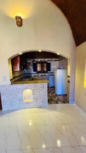 Kuchyň nebo kuchyňský kout v ubytování Villa el Nassem