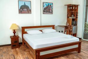 Postel nebo postele na pokoji v ubytování The Quale Villa