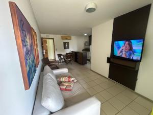 TV a/nebo společenská místnost v ubytování Marulhos Resort Flat E205