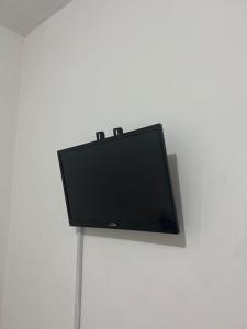 TV a/nebo společenská místnost v ubytování Hotel Palacio Real + 1 fotografie