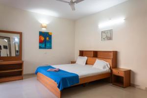 Postel nebo postele na pokoji v ubytování 2BHK Private Apartment