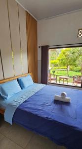 Postel nebo postele na pokoji v ubytování Ady Homestay