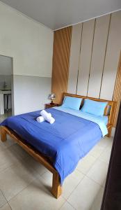 Postel nebo postele na pokoji v ubytování Ady Homestay