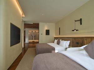 Zhangjiajie Juanjie Luxury Resorts--Provide free one-way airport pick-up service客房内的一张或多张床位