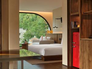 Zhangjiajie Juanjie Luxury Resorts--Provide free one-way airport pick-up service客房内的一张或多张床位