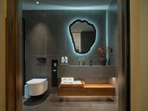 Zhangjiajie Juanjie Luxury Resorts--Provide free one-way airport pick-up service的一间浴室
