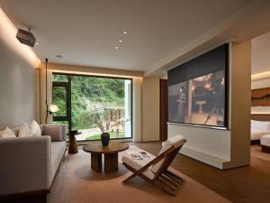 Zhangjiajie Juanjie Luxury Resorts--Provide free one-way airport pick-up service的休息区