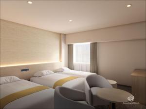 Postel nebo postele na pokoji v ubytování Daiwa Roynet Hotel Mito