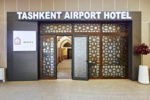 an entrance to a tashkent airport hotel with a door at Qo'noq Tashkent Airport Hotel Sleep Lounge & Showers, Terminal 2 - TRANSIT ONLY in Tashkent