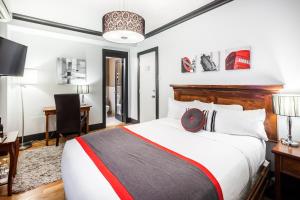 Tempat tidur dalam kamar di Hotel Acadia